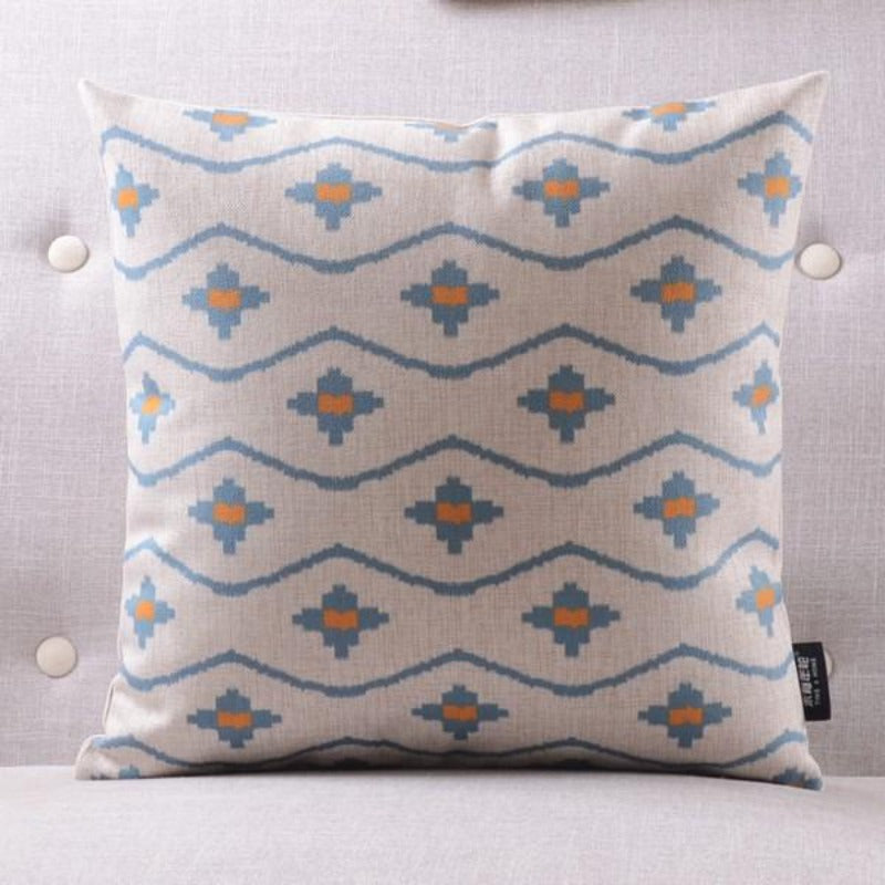 The Clementine + Teal Ikat Pillow Cover Collection